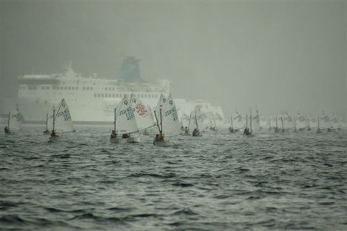 The Interislander behind the fleet at the South Island Optimist Championships. Photo: kimberley@somerville.co.nz © Kimberley Somerville